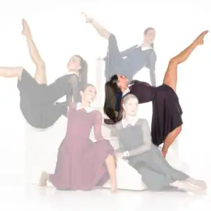 Five dancers pose in dresses against a white background.