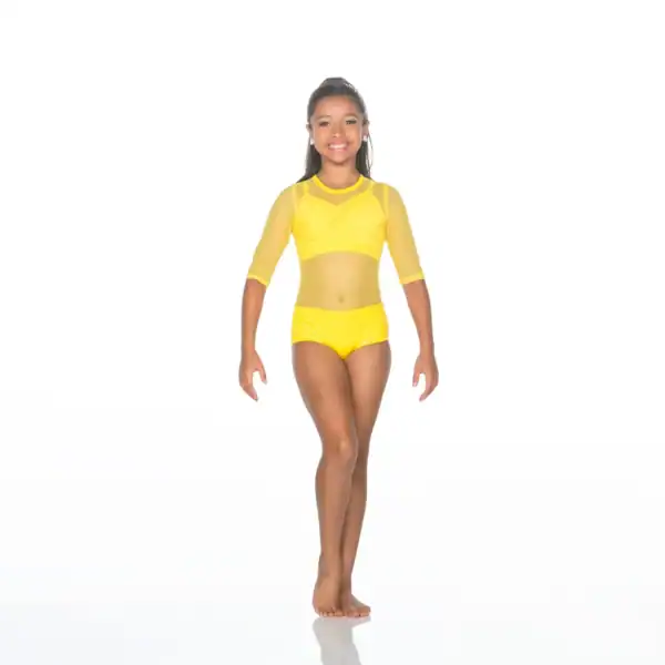 Smiling young dancer wearing a bright yellow dance costume