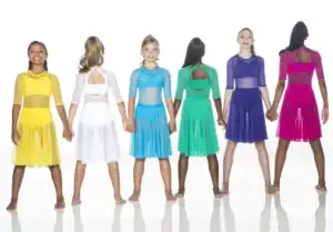 Six girls holding hands in colorful dance costumes