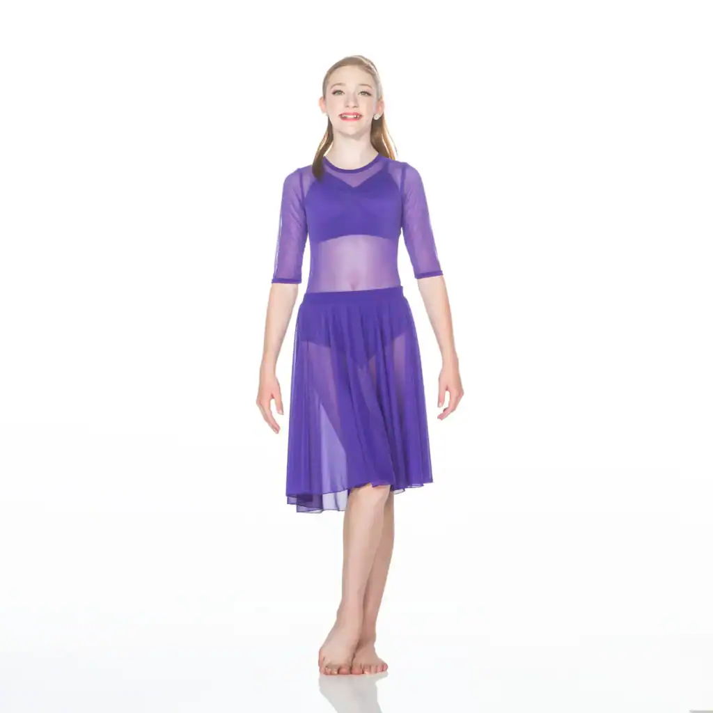 Young dancer wearing a purple sheer dance dress