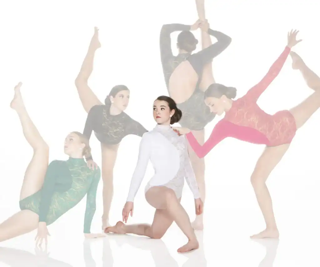 Five dancers pose in colorful lace leotards on white background.