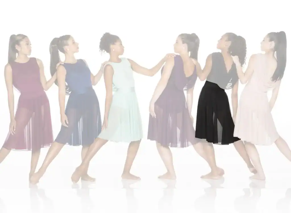 Six women wearing flowing dresses pose in a line