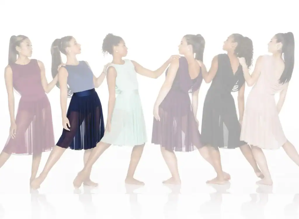 Six women wearing colorful chiffon dresses pose in a line.
