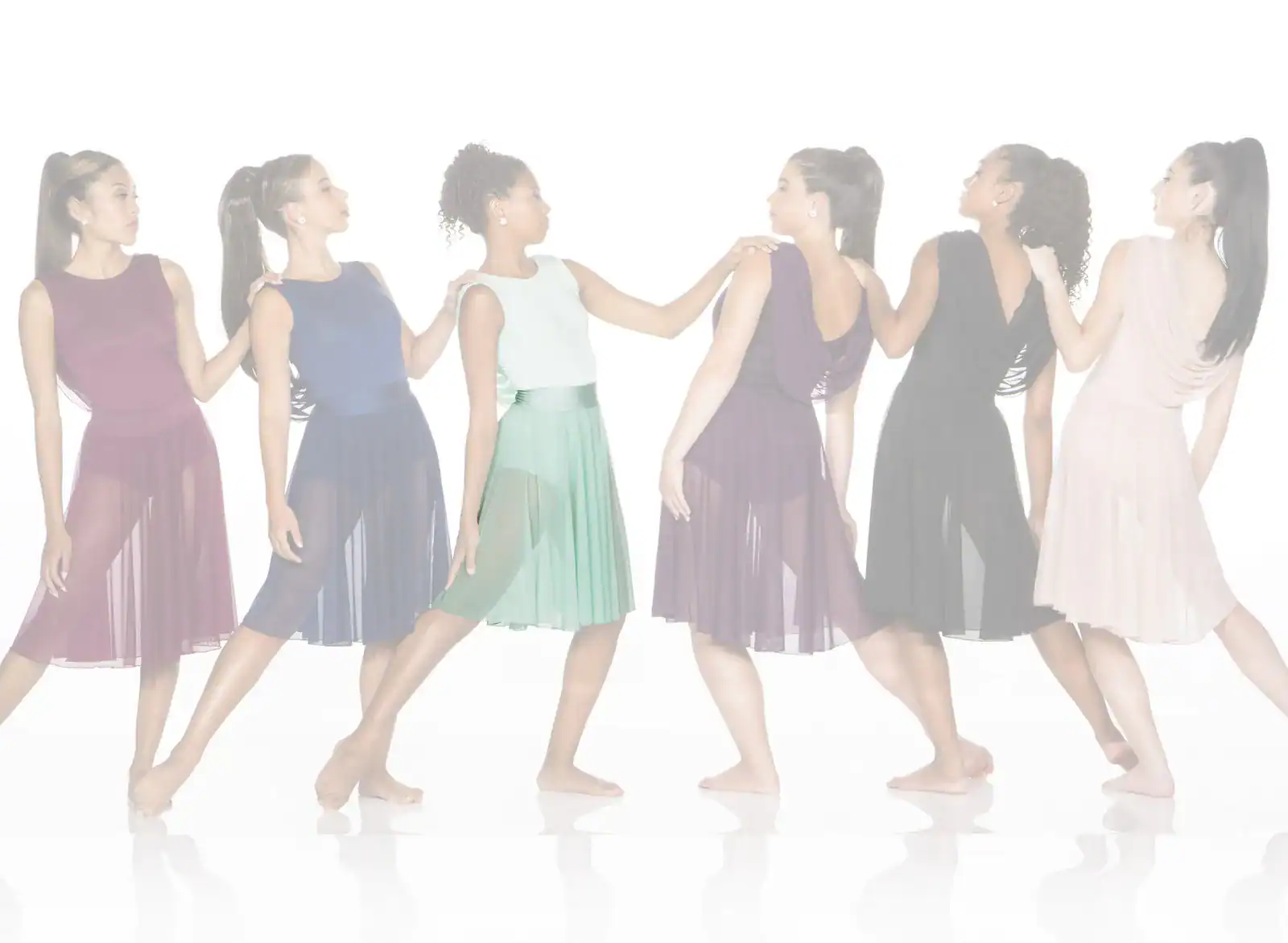 Six women modeling colorful sleeveless dresses in a studio