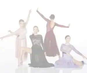 Four dancers posing in elegant flowing dresses