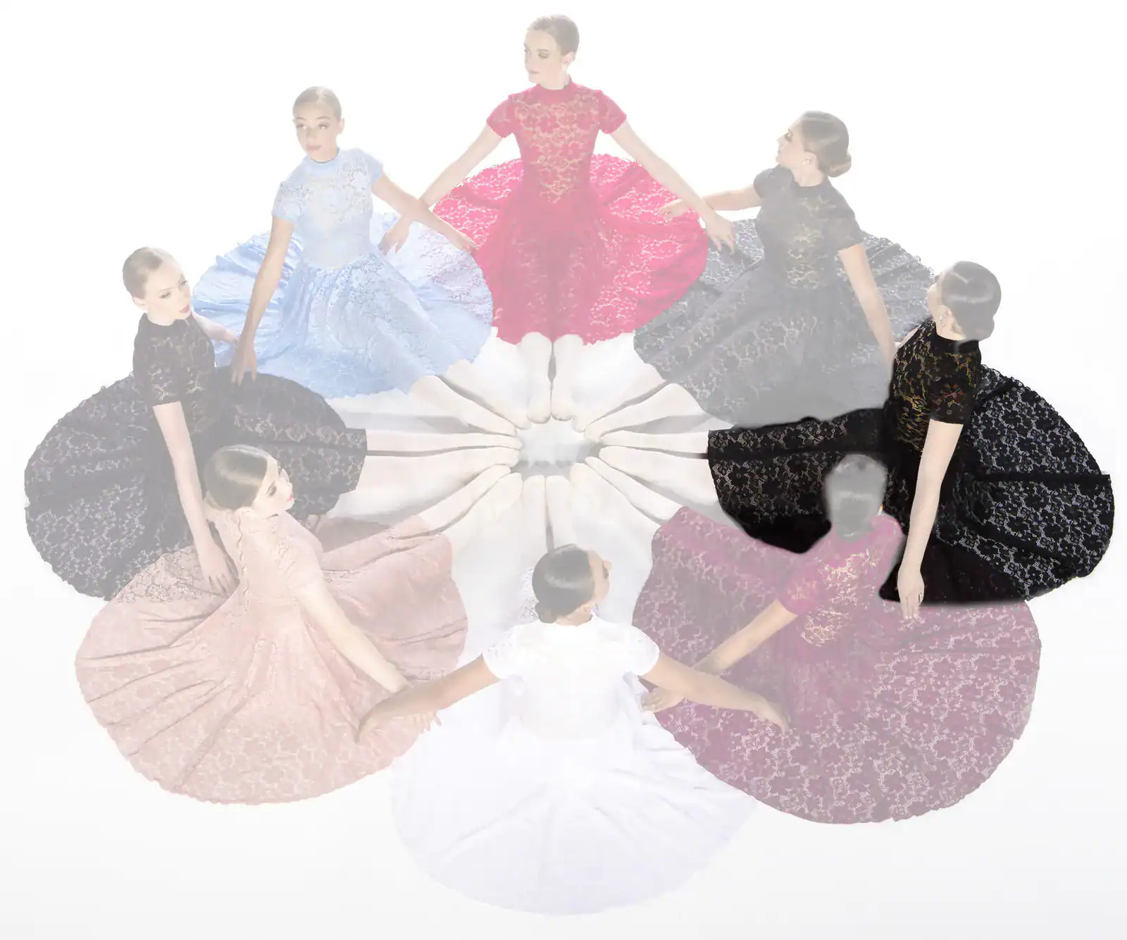 Women in colorful lace dresses seated in a circle