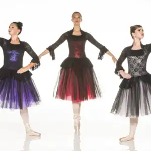 Three ballet dancers in colorful black lace dresses