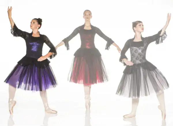 Three ballerinas pose in black lace dresses with colorful skirts.