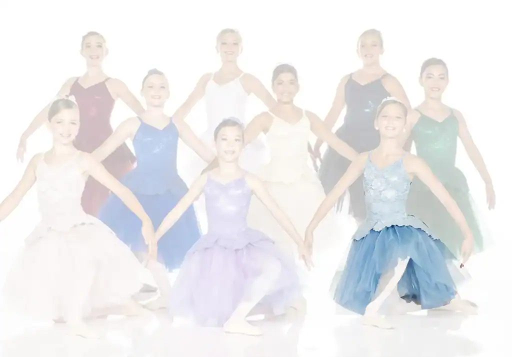 Young ballerinas in colorful tutus posing against white background