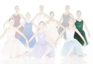 Group of young ballet dancers in colorful costumes posing