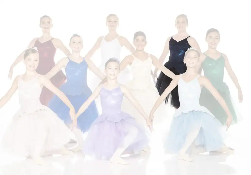 Young ballet dancers posing in colorful costumes