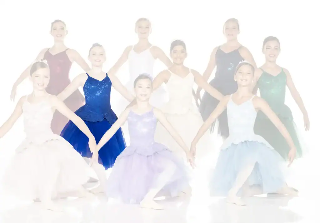 Young ballet dancers posing in colorful costumes