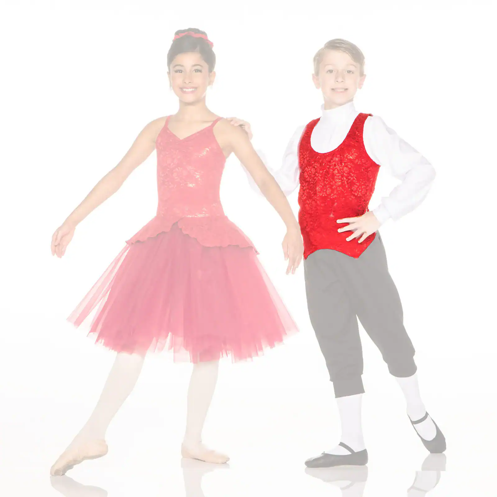 Young ballet dancers posing in red costumes