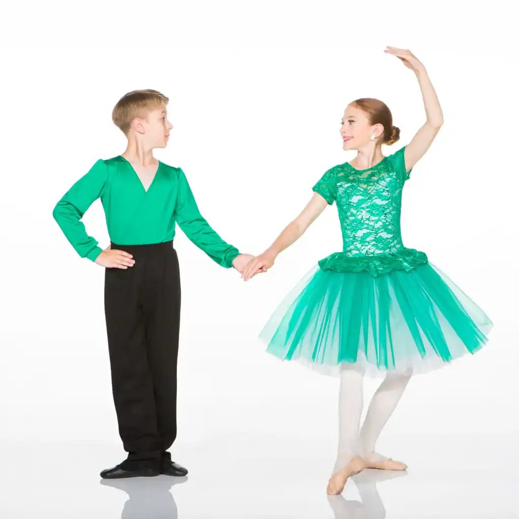 Young boy and ballerina holding hands in green costumes