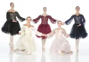 Five ballet dancers in colorful tutus posing together