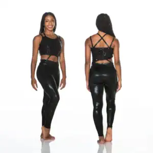 Model wearing black sequined crop top and shiny leggings