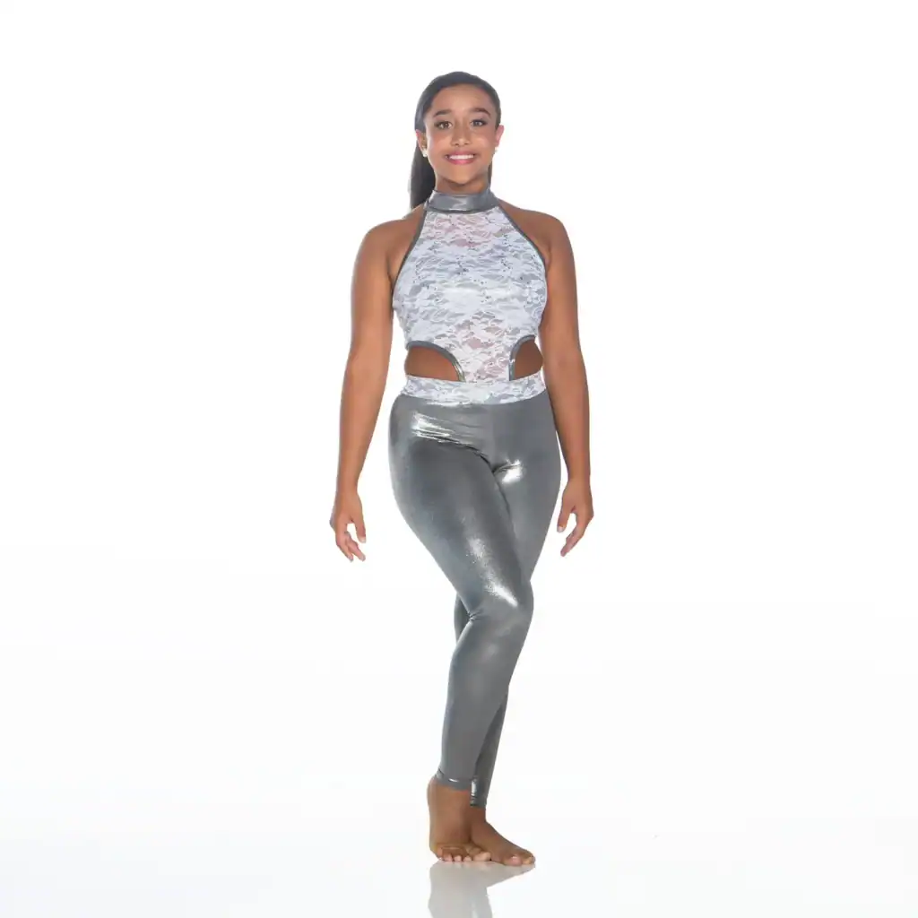 Smiling dancer in silver lace top and metallic leggings