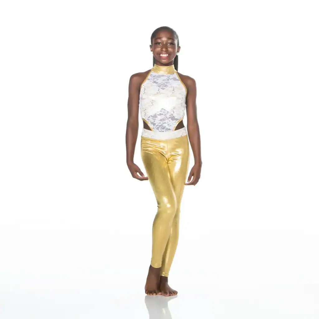 Smiling dancer wearing white lace top and gold leggings