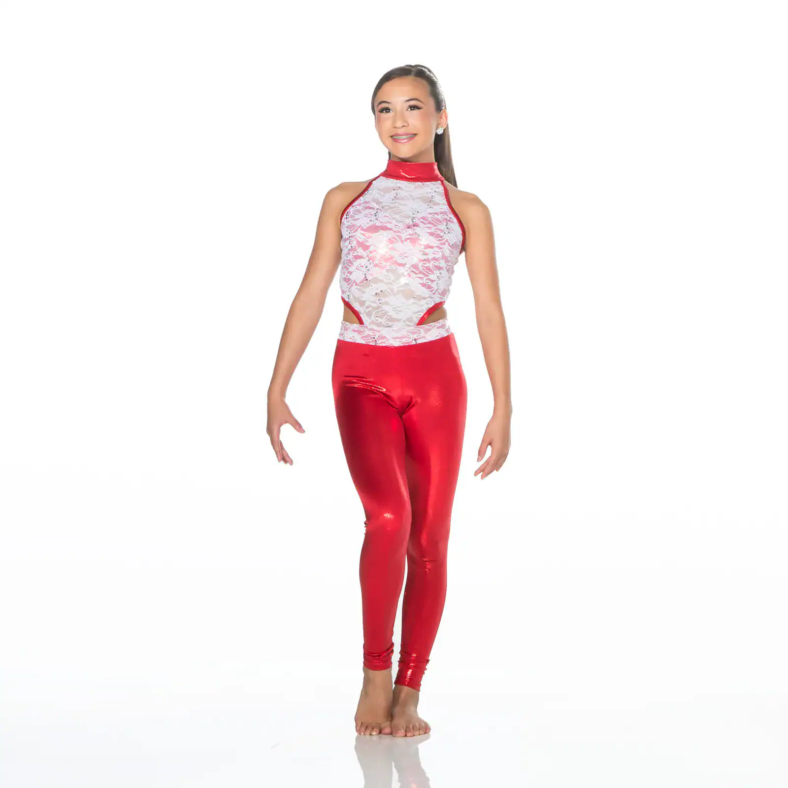 Girl wearing red leggings and white lace dance costume