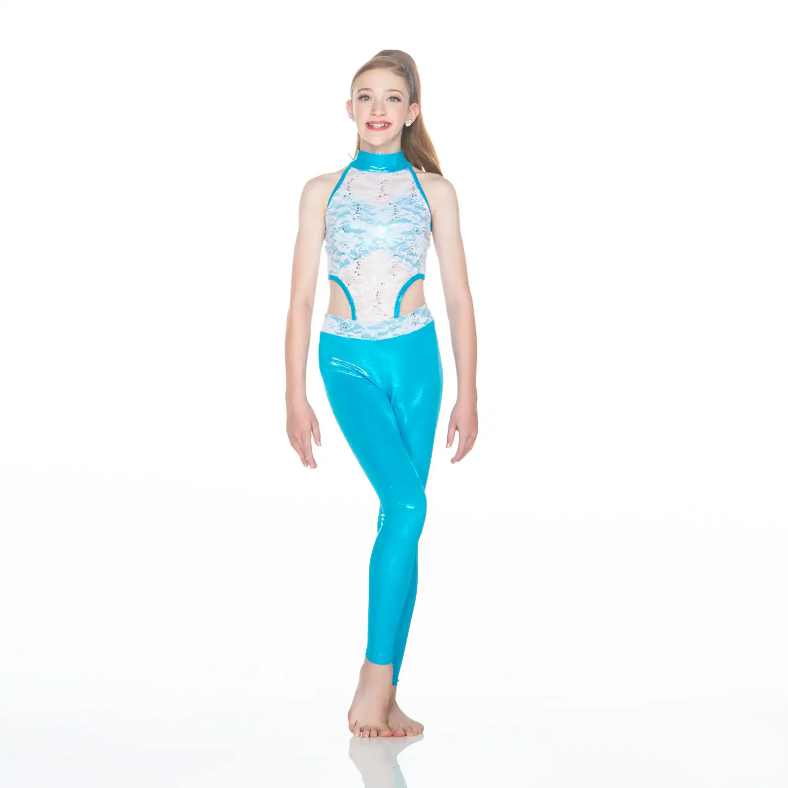 Young dancer wearing a turquoise and white performance costume