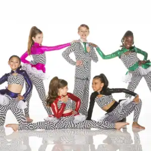 Six young dancers pose in colorful checkerboard costumes.