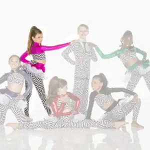 Six young dancers pose in colorful checkered costumes.