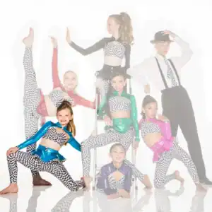 Youth dance team in colorful checkered costumes posing together