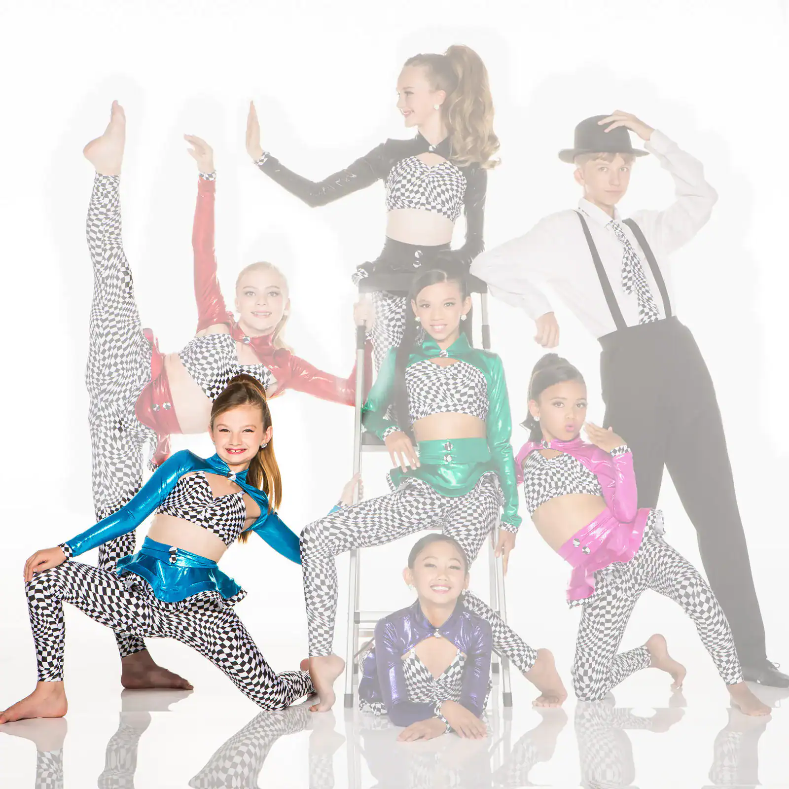 Youth dance team in colorful checkered costumes posing together