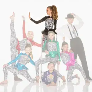 Youth dance team posing in colorful checkered costumes