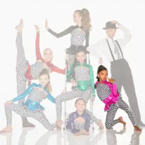 Youth dance team in colorful checkered costumes posing together