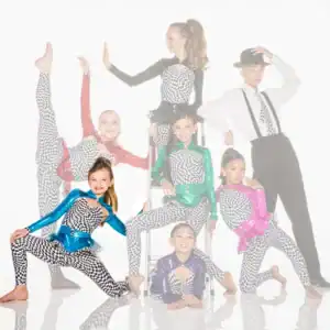 Young dancers posing in colorful checkerboard costumes