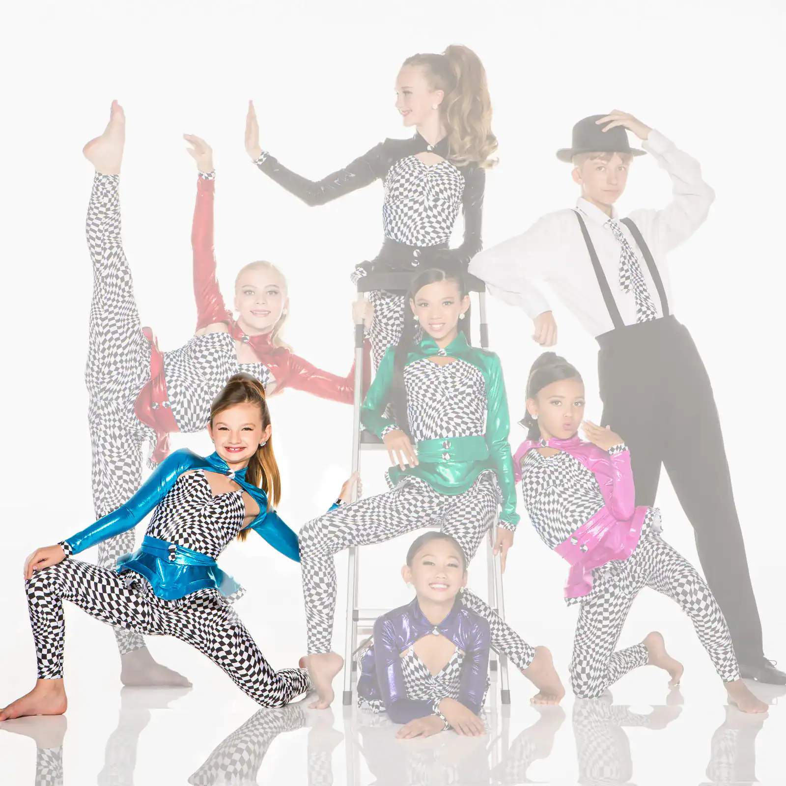 Young dancers posing in colorful checkerboard costumes