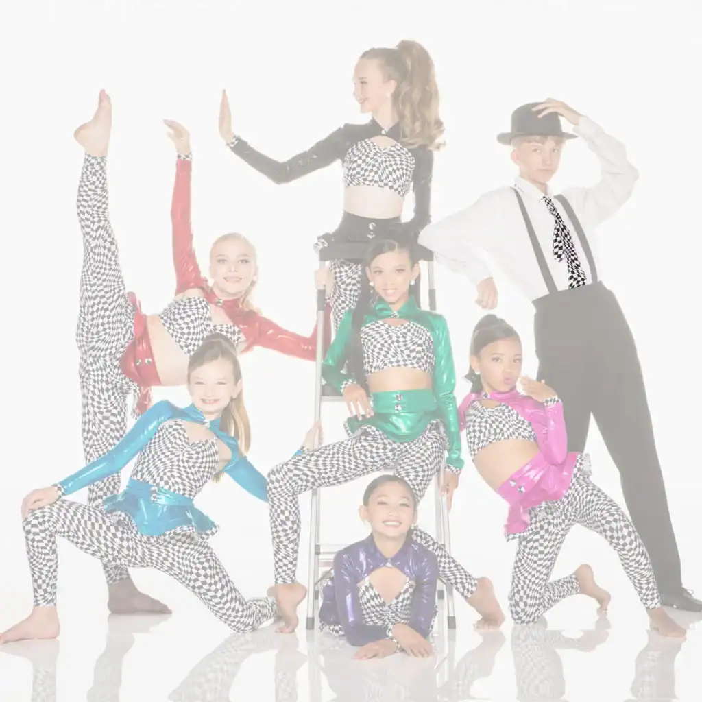 Young dance troupe posing in colorful checkered costumes
