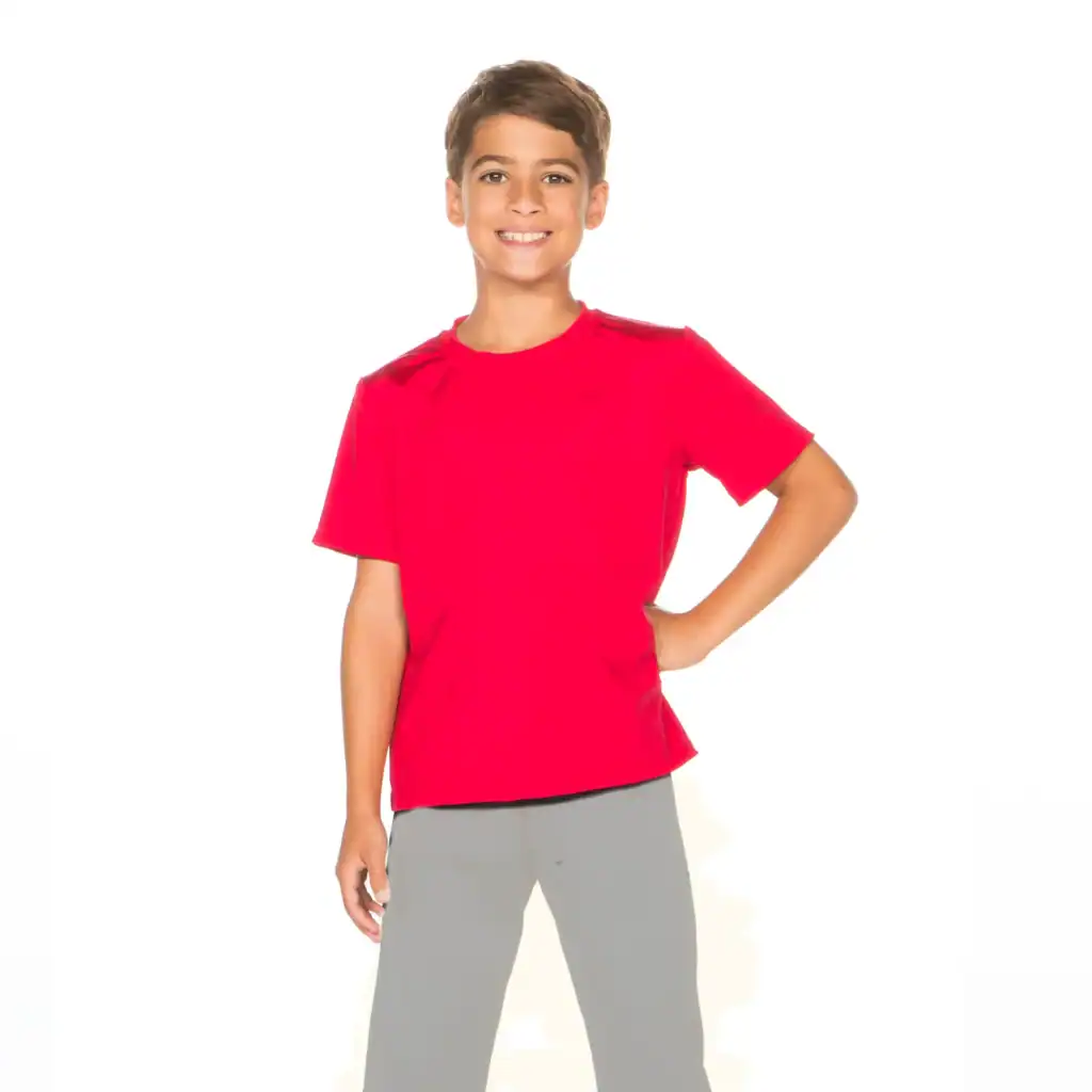 Smiling boy wearing red shirt and gray pants