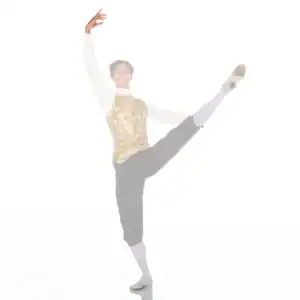 Male ballet dancer performing a high leg extension