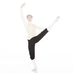 Male ballet dancer performing a high leg extension