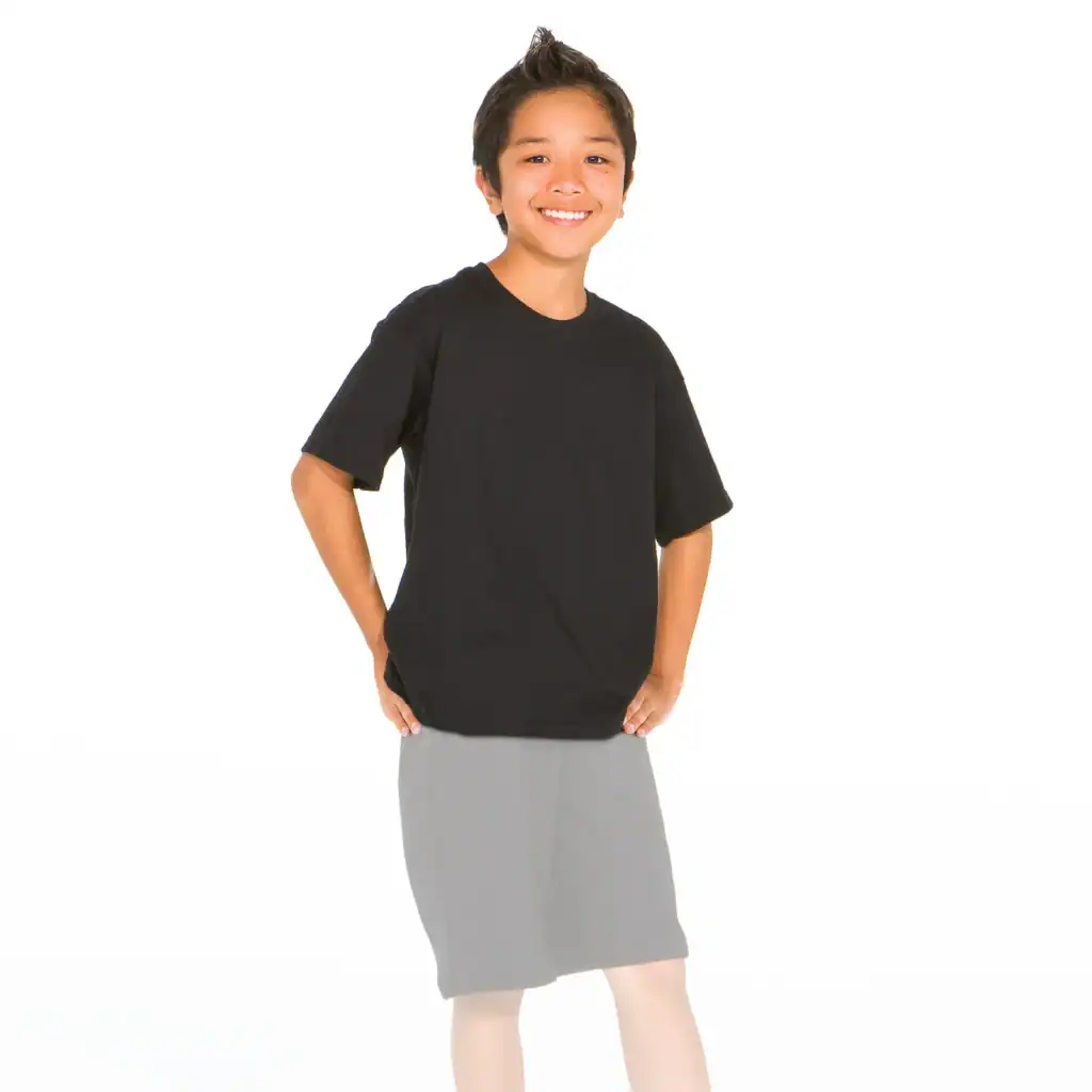 Smiling child wearing black T-shirt and gray shorts