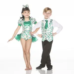 Two children wearing matching green and silver dance costumes