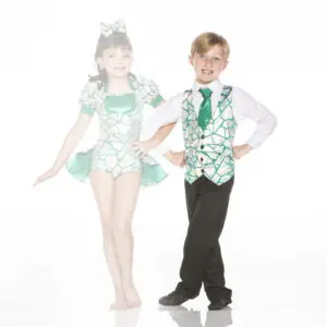 Two children wearing coordinated green and silver dance costumes