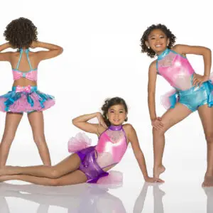 Three girls modeling colorful dance costumes against white background