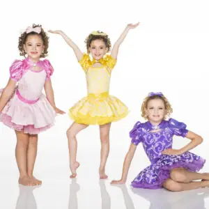 Three young girls wearing colorful dance costumes posing