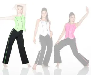 Three women modeling colorful vests and black pants