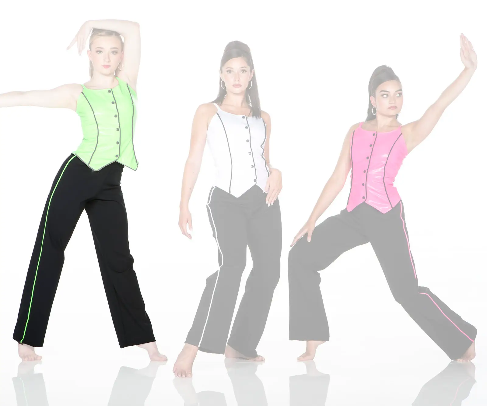 Three women modeling colorful vests and black pants