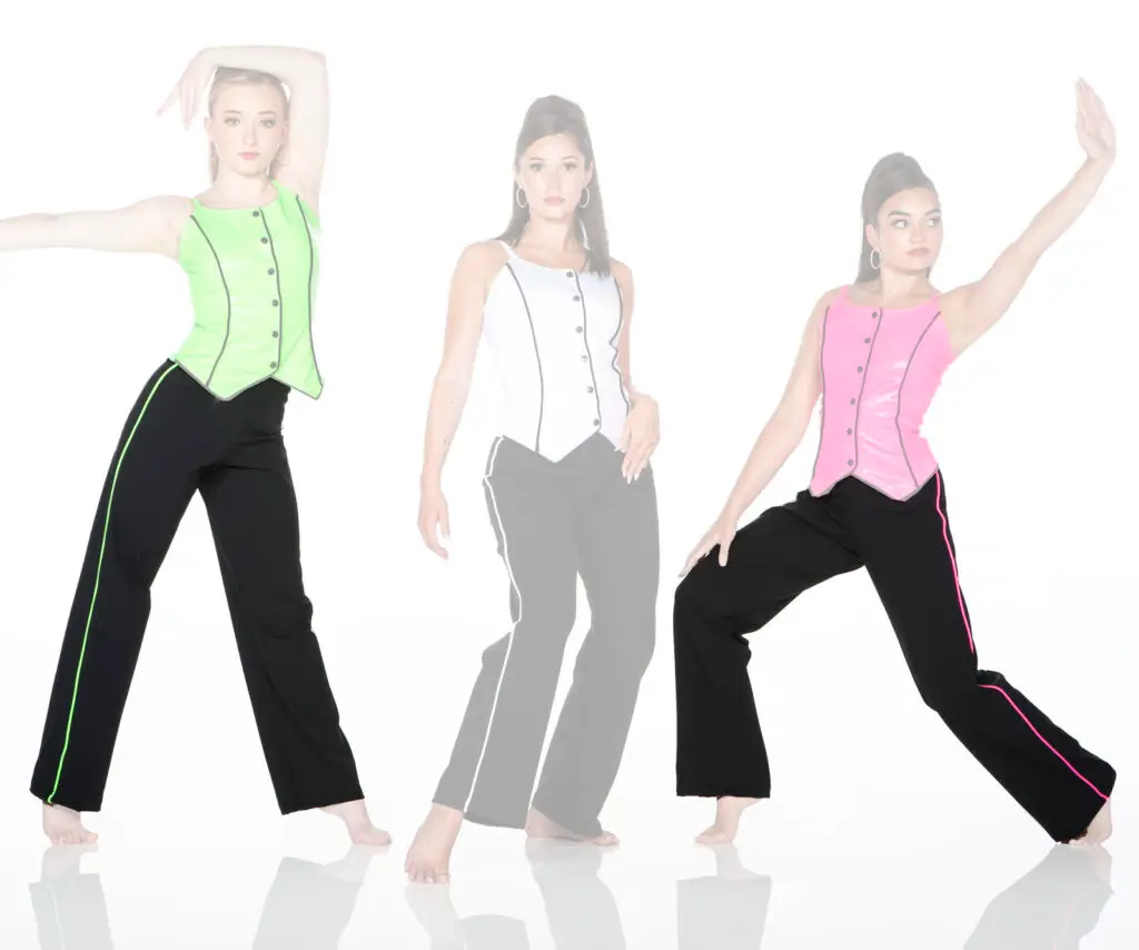 Three women modeling colorful vests and black pants