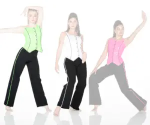 Three women modeling colorful vests and black pants