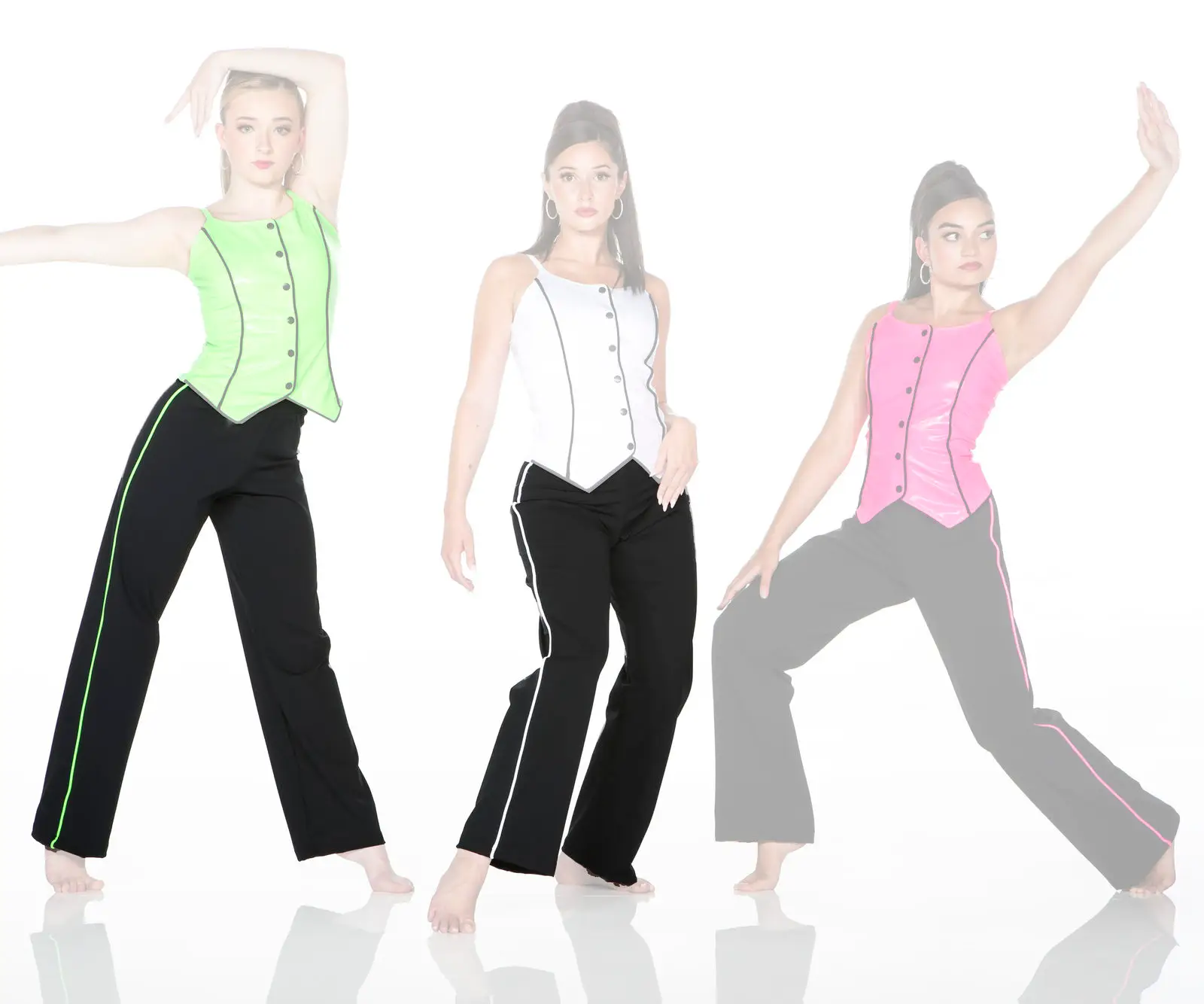 Three women modeling colorful vests and black pants