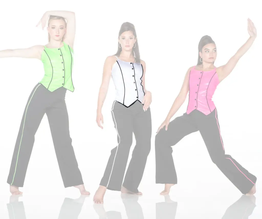 Three women pose in colorful vests and black pants.