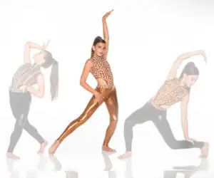 Woman in animal-print leotard and metallic leggings striking dance poses