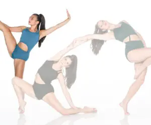 Three dancers in leotards posing against a white background