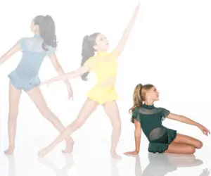 Three dancers model colorful leotards against a white background.
